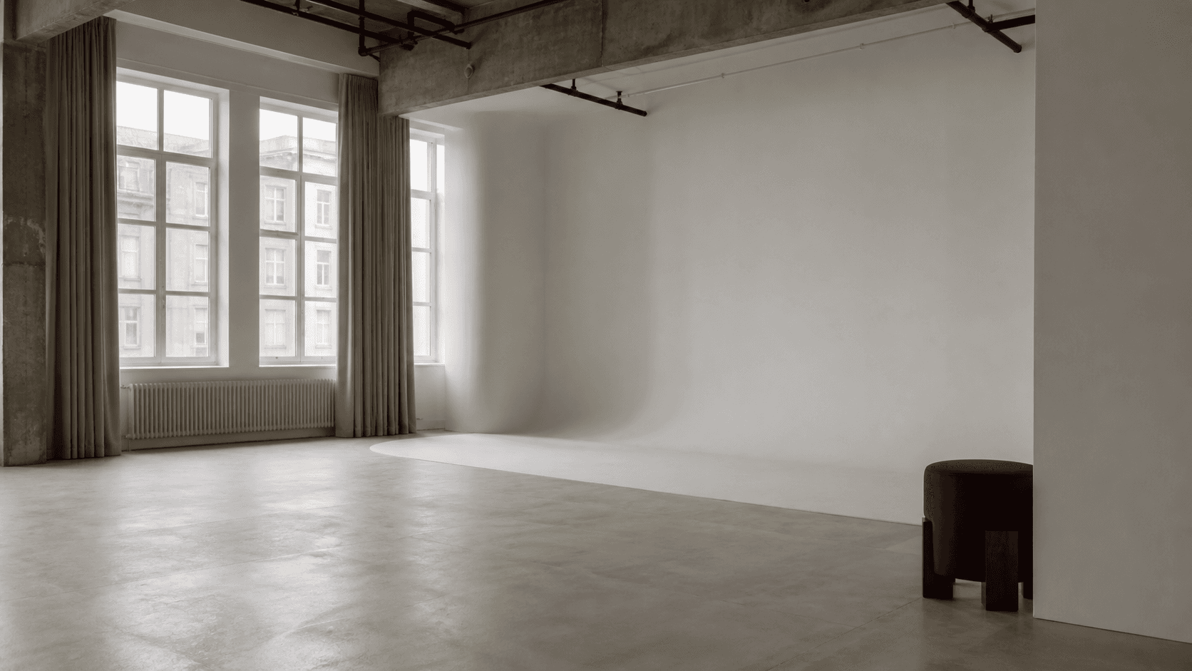 An empty daylight photography studio